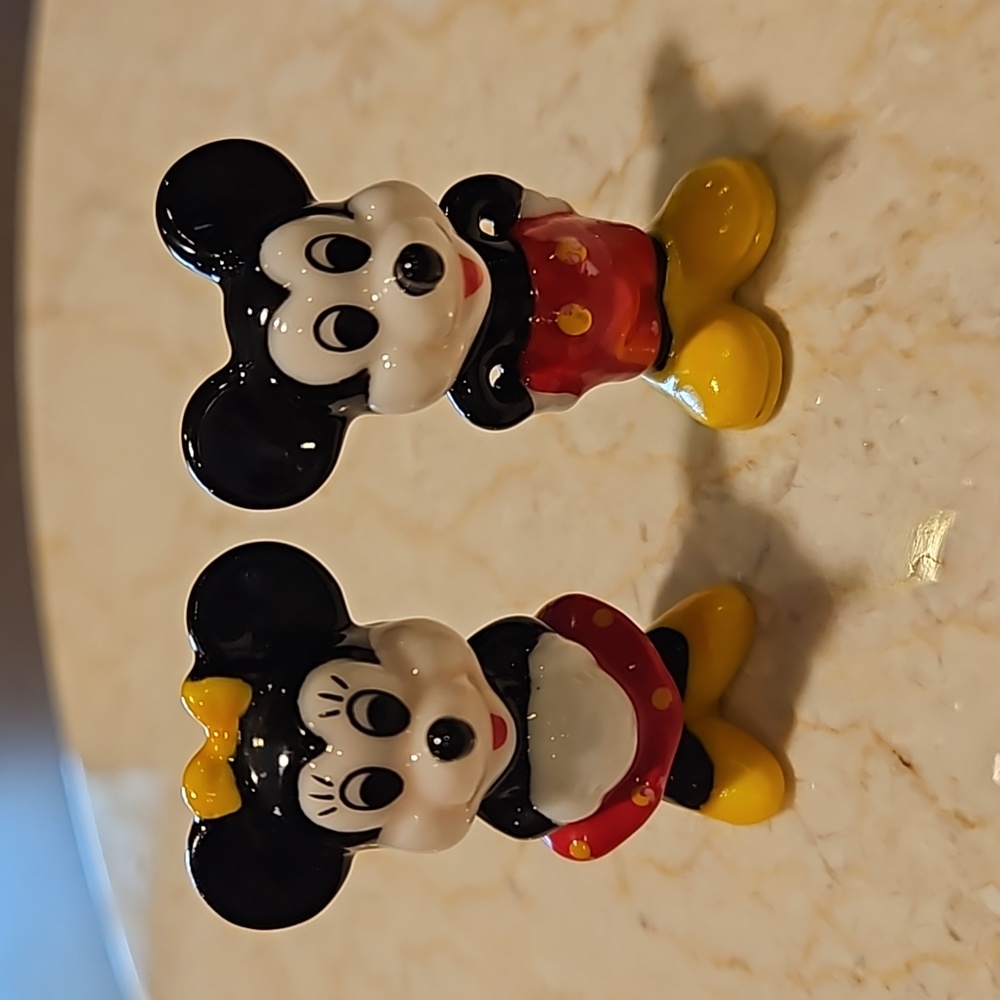 Mickey and Minney Mouse porcelain figurines. 1 and 3/4 inches tall